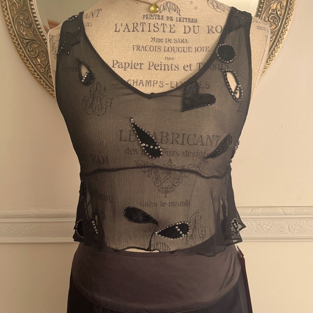 “Rebecca Taylor”  size 0. 100% silk top